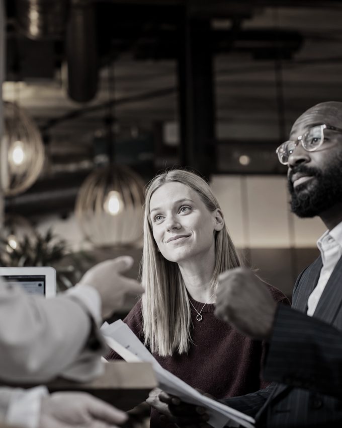 Advisers in conversation with a client